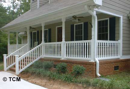 Colonial baluster installed on the front porch with stairs