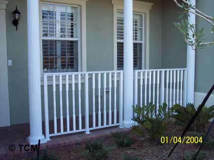 Front porch shown with Colonial Spindle / Baluster