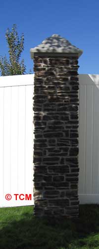 Rock colunm with vinyl privacy fence