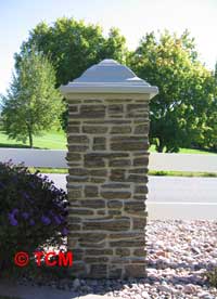 Large pillar with 2 rail ranch fence