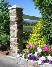 Pre formed faux pillar with flower garden