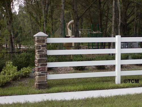 Ranch rail with stone rock post pillars