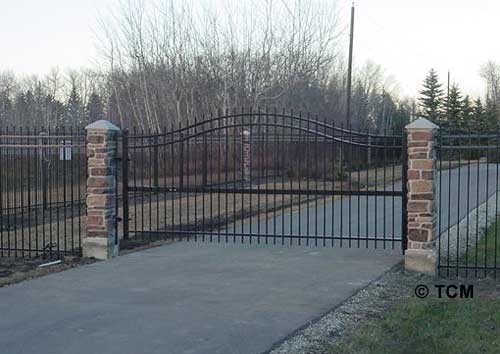 Faux Rock Coluns with ornamental gate