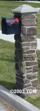 Faux rock pillar with mailbox